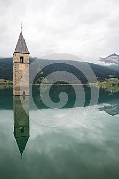 Church tower of Lago di Resia in Curon Venosta