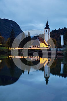 Church tower and stone bridge at Lake Bohinj