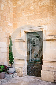 The Church of the Transfiguration on Mount Tabor, Nazareth, Israel. Old door, detail, copy space