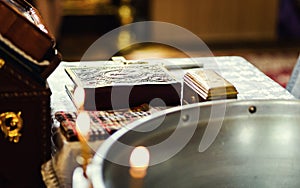 Church utensil on an altar, glans, cross on the church altar, the photo