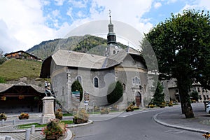 Church of a village in the French Alps in Haute-Savoie in summer