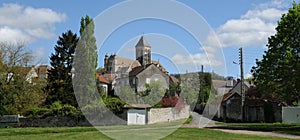 Church and village of Vetheuil in Val d Oise photo