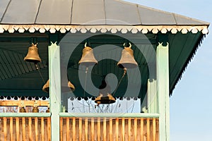 Church vintage bells on a wooden bell tower.