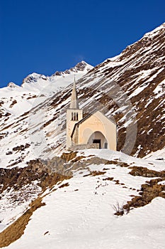 Church in winter alpine landscape