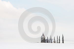 Church in a winterly landscape photo