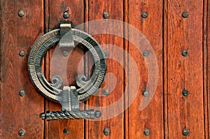 Church wooden doors and intricate metal hinges