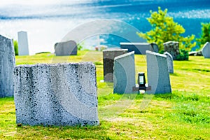 Churchyard in Nes village at fjord, Norway