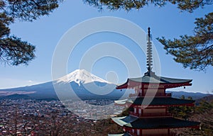 Chureito Pagoda temple in the Five Lakes Region and the highest mountain of Japan, Mt Fuji, in the distance