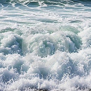 Churning ocean waves with white foam