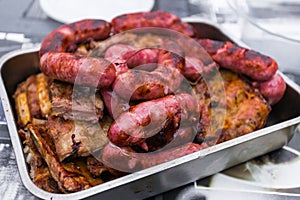 Churrasco de cerdo, chargrilled pork meat photo