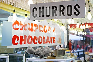 Churros and chocolate fritter typical food in Valencia Fallas