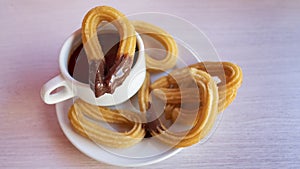 Churros con chocolate caliente, a traditional Spanish street food photo