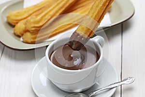 Churros and hot chocolate, spanish breakfast photo