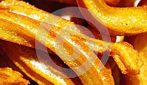 Churros on a plate for snack or breakfast typical of Spain