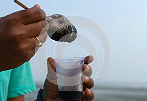 Chuski Or Baraf ka Gola also known as Ice candy, popular roadside refreshment in Indian summering kala khatta, orange and mixed