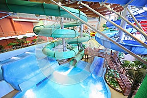 Chutes as spiral and staircase in aquapark