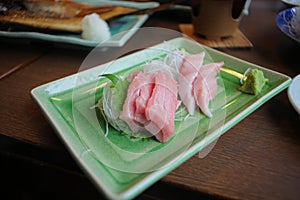 Chutoro and Otoro Sashimi on a green plate Is a premium