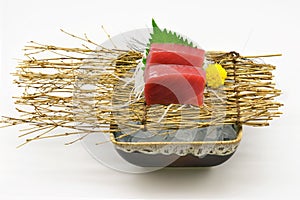 Chutoro & x28;Tuna& x29; sashimi in brown bowl Japanese style on white background