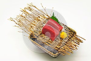 Chutoro & x28;Tuna& x29; sashimi in brown bowl Japanese style on white background