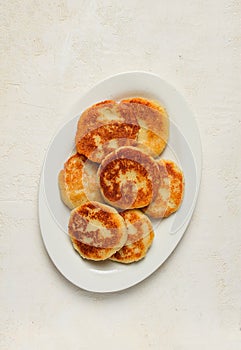 Chvishtari, corn flour tortillas with cheese, pastries, Georgian cuisine, Mchadi, homemade, top view, on a wooden table