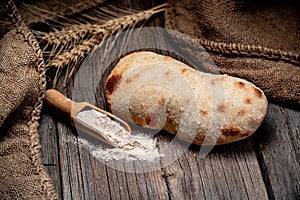 Ciabatta Bread on the wood tabled. Healthy food