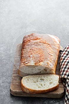 Ciabatta italian bread on gray background