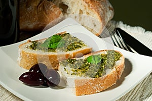 Ciabatta, pesto and olives