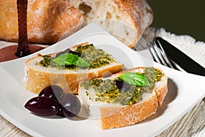 Ciabatta, pesto and olives