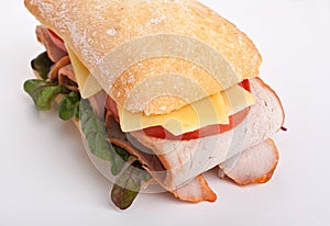 Ciabatta sandwich stuffed with meat