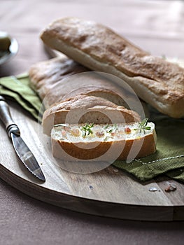 Ciabatta slice with himalayan salt, rosemary and olive oil