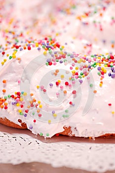 The ciaramicola is a typical Umbrian Easter cake; it is a donut-shaped cake, red in color with white icing and colored topping spr