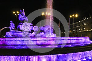 Cibeles fountain illuminated in purple for Women's Day