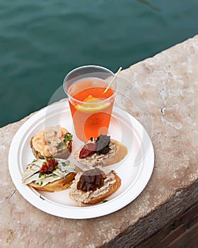 Cicchetti and Aperol Spritz traditional venetian food and drink