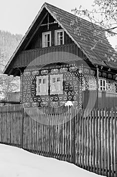 Cicmany, Slovakia. Old wooden houses in Slovakia village Cicmany in winter. The ornaments from Cicmany, and the Slovak folk patter