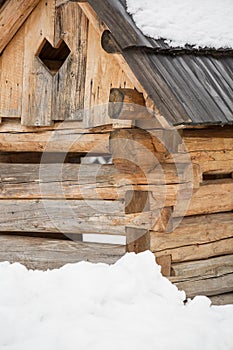 Cicmany, Slovakia. Old wooden houses in Slovakia village Cicmany in winter. The ornaments from Cicmany, and the Slovak folk patter