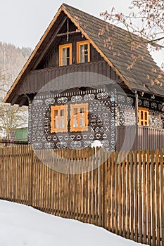 Cicmany, Slovakia. Old wooden houses in Slovakia village Cicmany in winter. The ornaments from Cicmany, and the Slovak folk patter