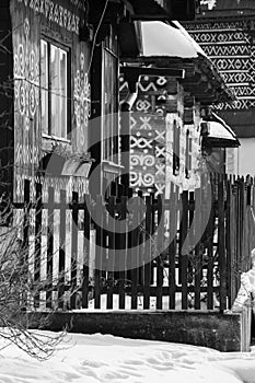 Cicmany, Slovakia. Old wooden houses in Slovakia village Cicmany in winter. The ornaments from Cicmany, and the Slovak folk patter