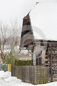 Cicmany, Slovakia. Old wooden houses in Slovakia village Cicmany in winter. The ornaments from Cicmany, and the Slovak folk patter