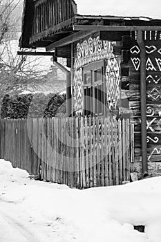 Cicmany, Slovakia. Old wooden houses in Slovakia village Cicmany in winter. The ornaments from Cicmany, and the Slovak folk patter