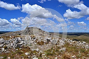 Cielo, nubes y piedras en el cerro campanero en Minas, Lavalleja, Uruguay photo