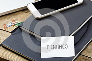 Cientifico, Spanish text for Scientist business card on office d photo
