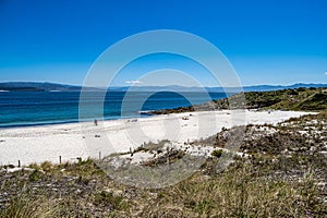 Cies Islands, Spain - Jul 01, 2023: Praia de Figueiras beach at the east coast of Illas Cies, Galicia, Spain