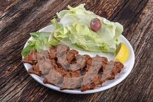 Cig kofte, a raw meat dish in Turkish and Armenian cuisines. Turkish cig means