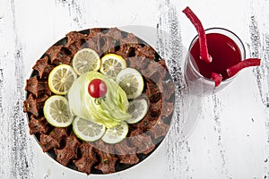 Cig kofte, a raw meat dish in Turkish and Armenian cuisines. Turkish cig means