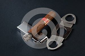 Cigar, lighter and cutter