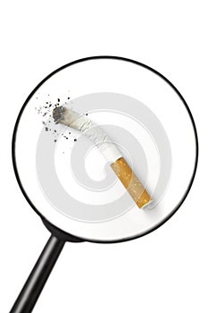 Cigarette viewed through magnifying glass