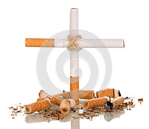 Cigarettes and cross close-up