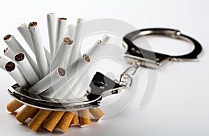 Cigarettes locked to handcuffs