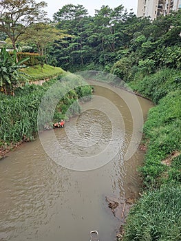 The Ciliwung River passes beside the Atohir Mosque