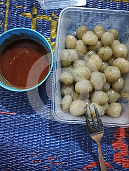 Cilok is a food made from starch, cilok is very delicious when enjoyed when it rains and added with spicy sauce